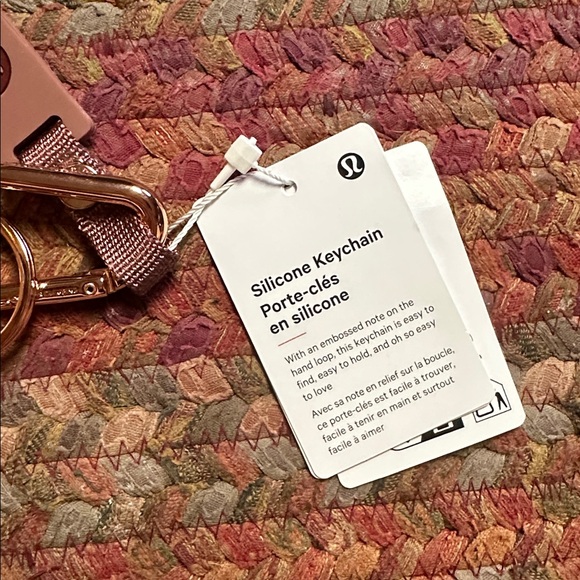 NWT LULULEMON ROSE GOLD PINK SILICONE KEYCHAIN - Picture 2 of 3